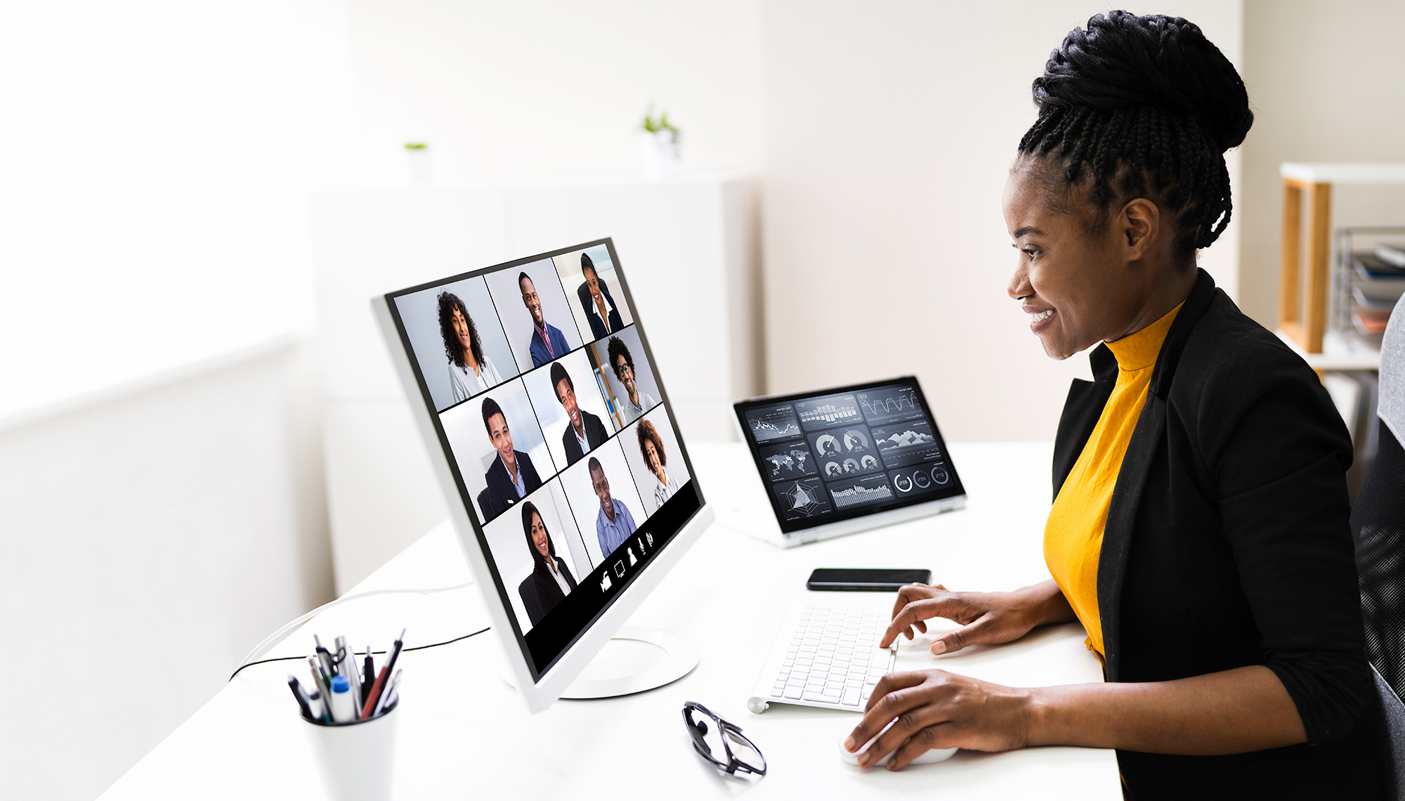 Woman sitting at a desk in a conference call